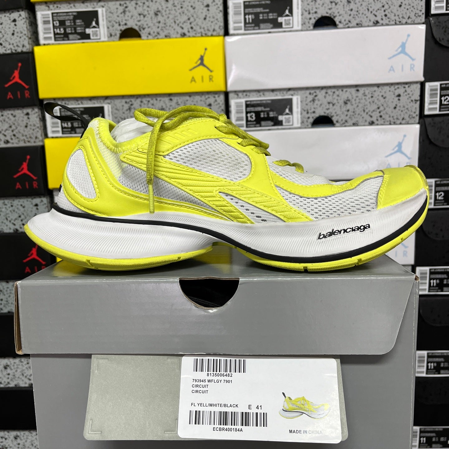 Lime green and white Balenciaga sneaker with chunky white sole and lace-up front