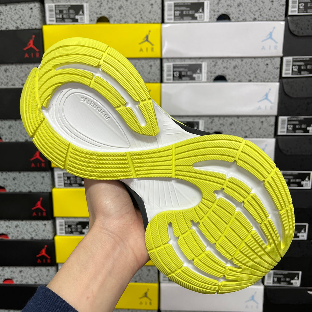 Outsole of lime green Balenciaga sneaker showing tread patterns