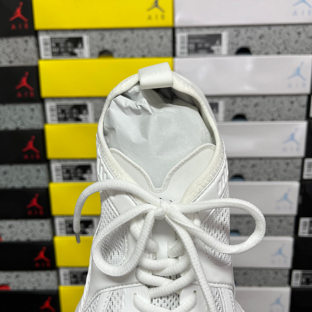 White Balenciaga sneaker heel with pull tab and lace-up front
