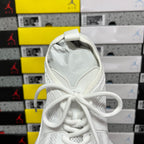 White Balenciaga sneaker heel with pull tab and lace-up front