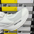 White Balenciaga sneaker side profile with woven texture and thick sole