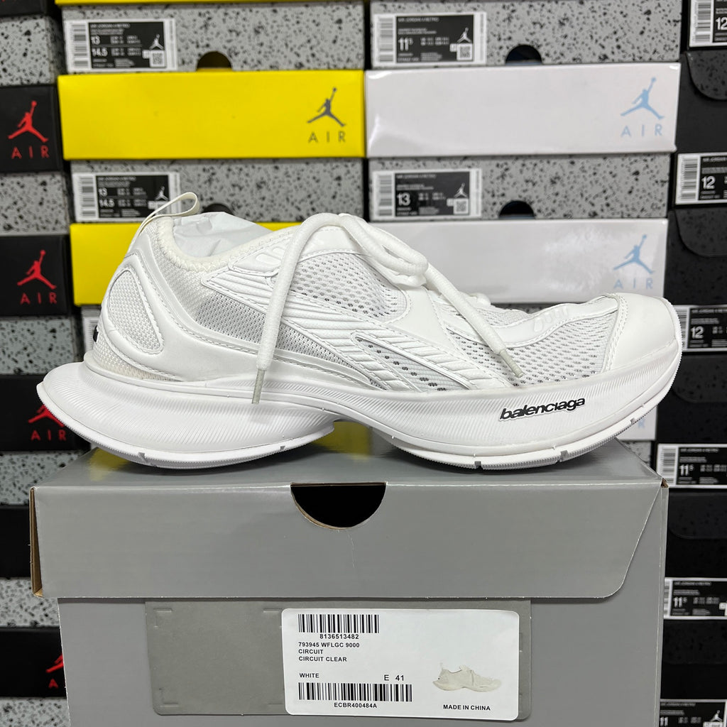 White lace-up Balenciaga sneaker with chunky cushioned sole and side stripe detail