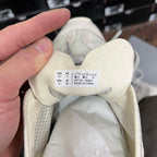 Shoe size label inside an off-white lace-up running shoe, marked E 41 and USA 27