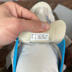 Balenciaga unisex sneakers size label on blue-edged tongue, inside heel view