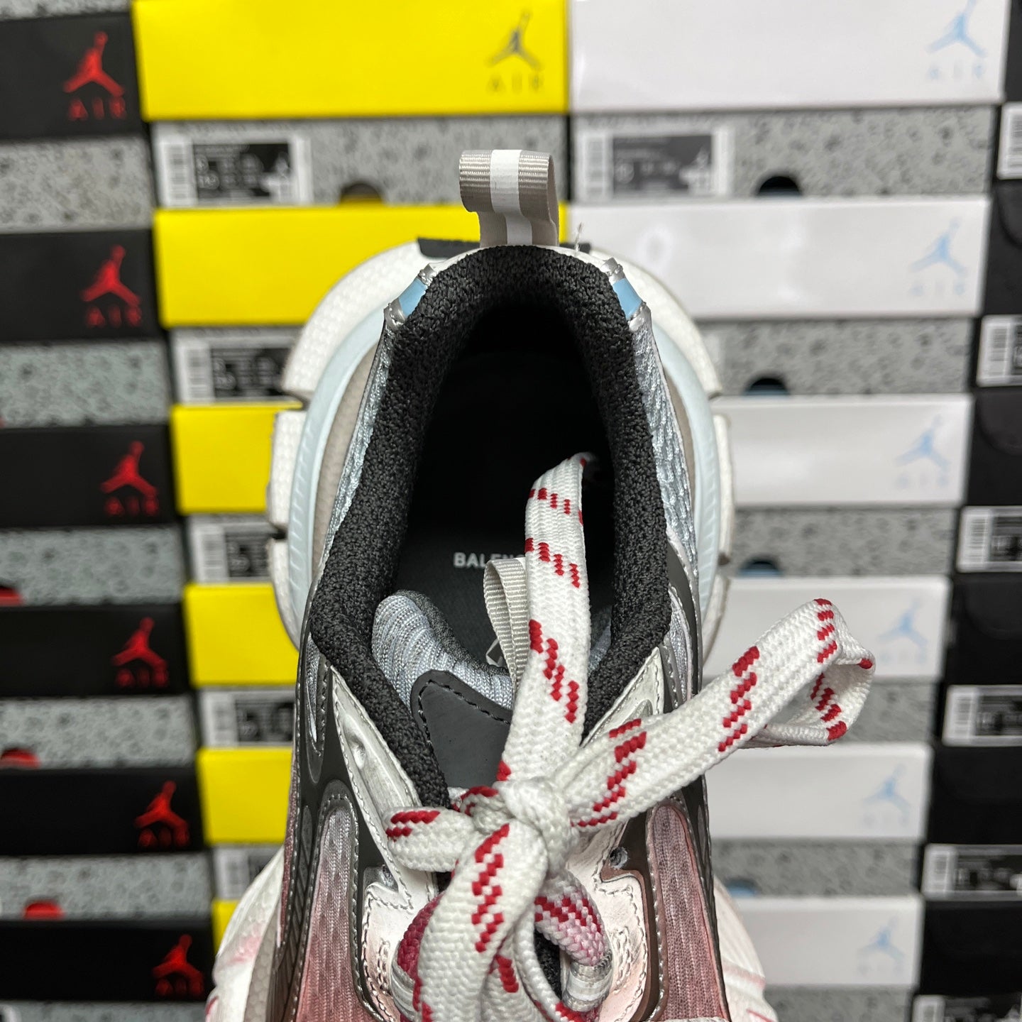Balenciaga runner sneaker heel with black lining and white-red lace tips