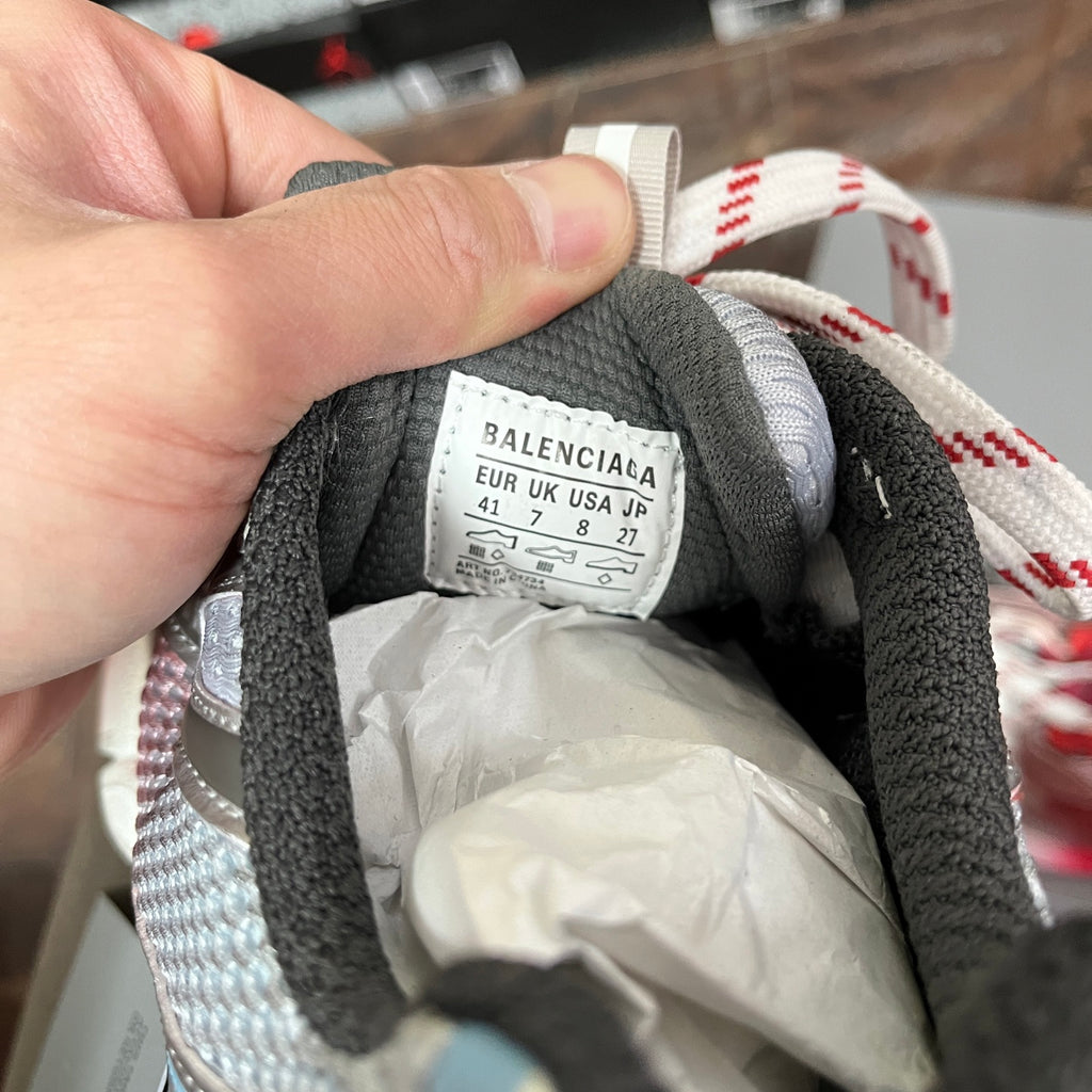 Balenciaga size label inside sneaker with '41' and care text