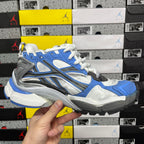 Balenciaga unisex chunky sneakers, front side view, blue upper with white laces