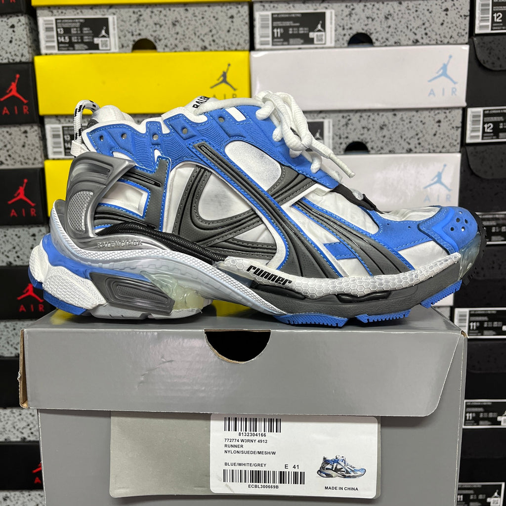 Balenciaga unisex chunky sneakers, side view, blue panels with white laces and gray accents