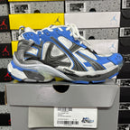 Balenciaga unisex chunky sneakers, side view, blue panels with white laces and gray accents