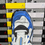 Balenciaga unisex sneakers showing tongue and heel, blue upper with white laces