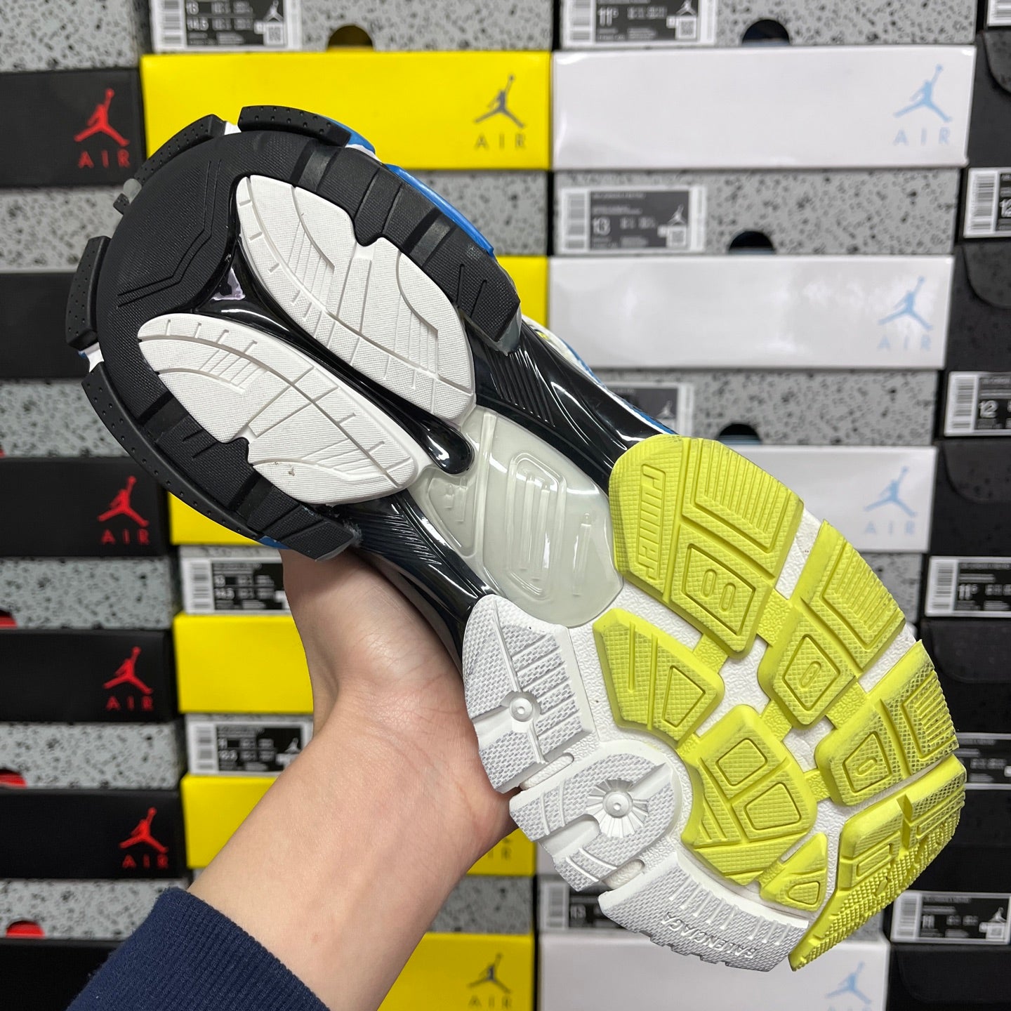 Balenciaga unisex luxury shoes outsole, black and white tread with neon yellow-green bottom