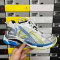 Balenciaga unisex luxury shoes, white mesh with blue and yellow trim, lace-up sneaker sole