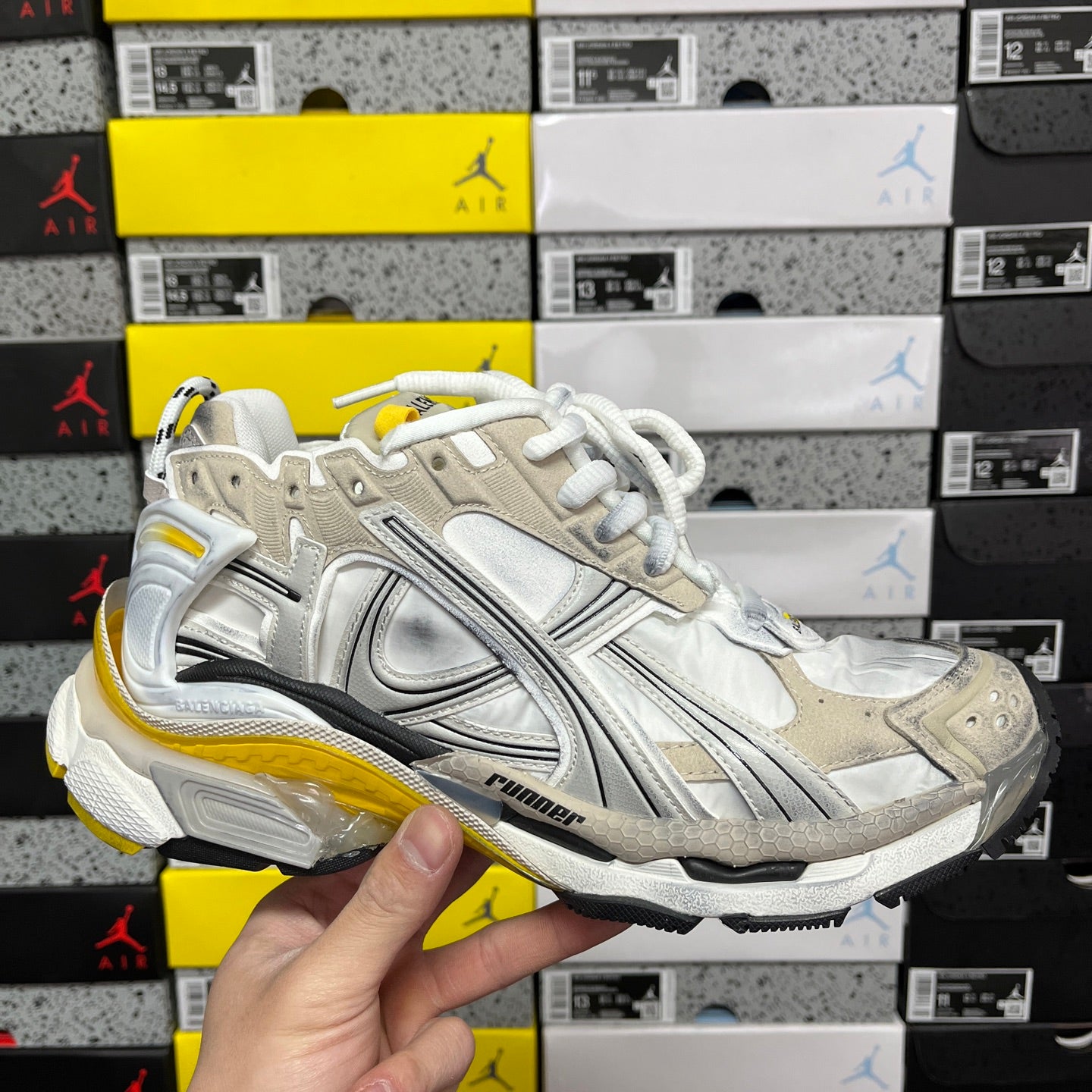 White and metallic Balenciaga unisex sneaker with yellow sole and white laces