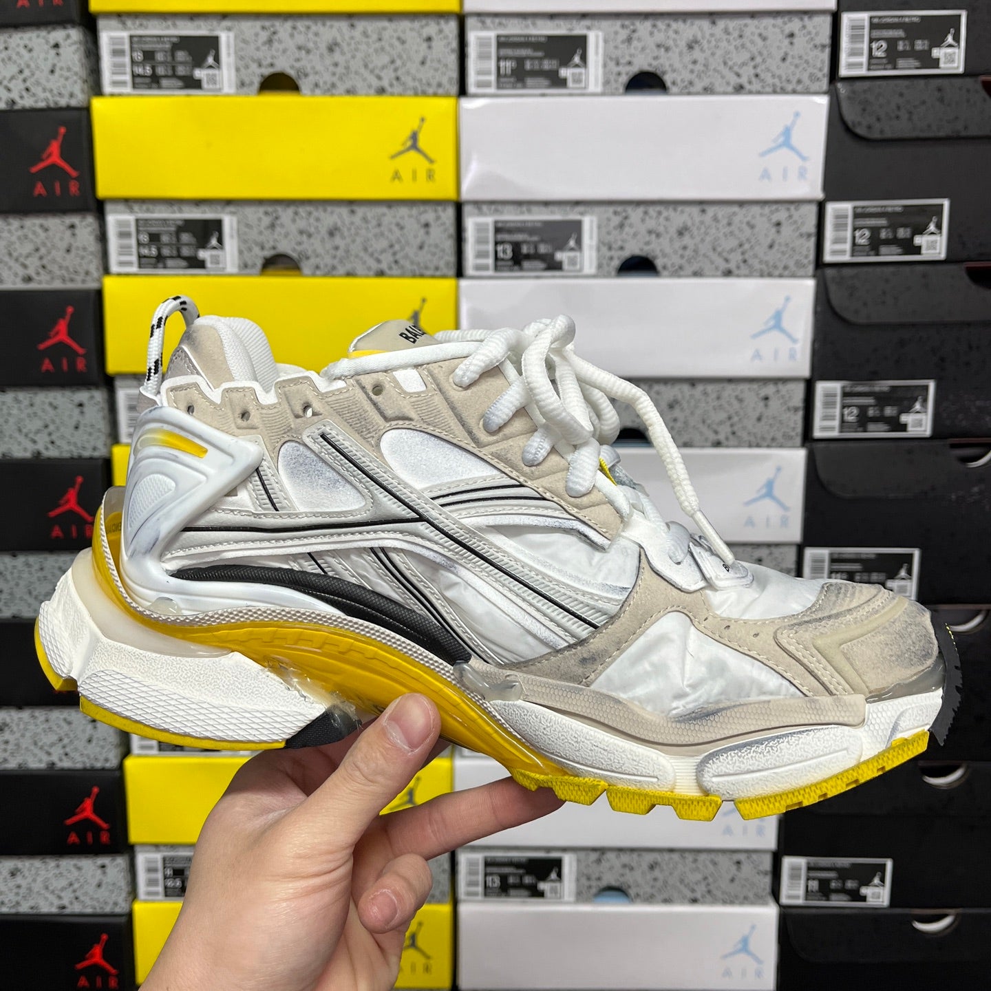 White and metallic Balenciaga unisex sneaker with yellow sole and front lace panel