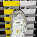 Cream Balenciaga unisex sneaker heel with white laces and textured collar