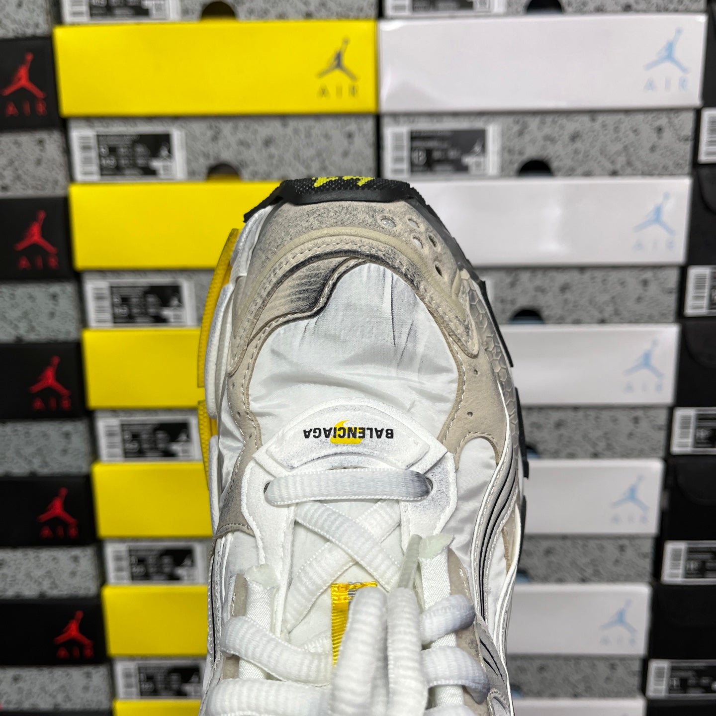 Cream Balenciaga unisex sneaker heel with white laces and textured collar