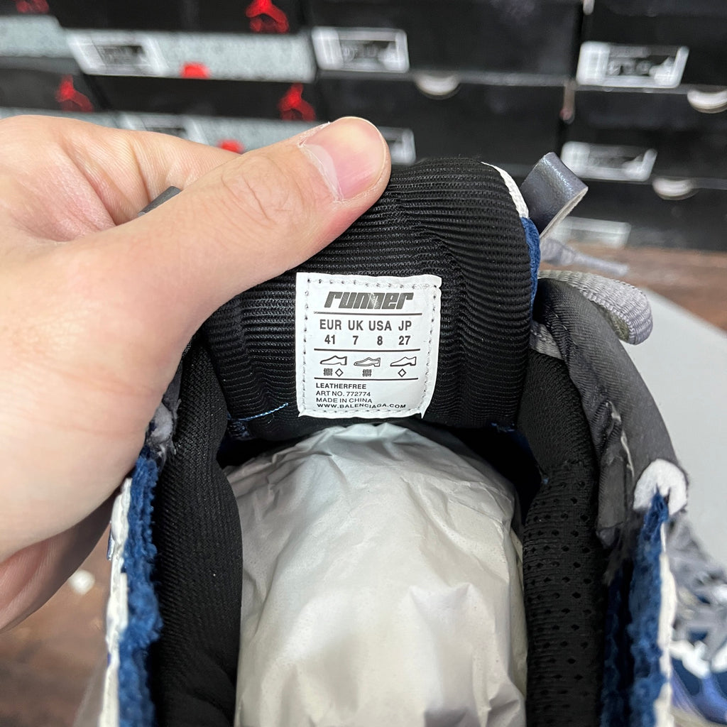Black sneaker tongue label with EU/UK size and runner branding