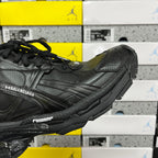 Balenciaga unisex black runner shoe side close-up with sculpted sole