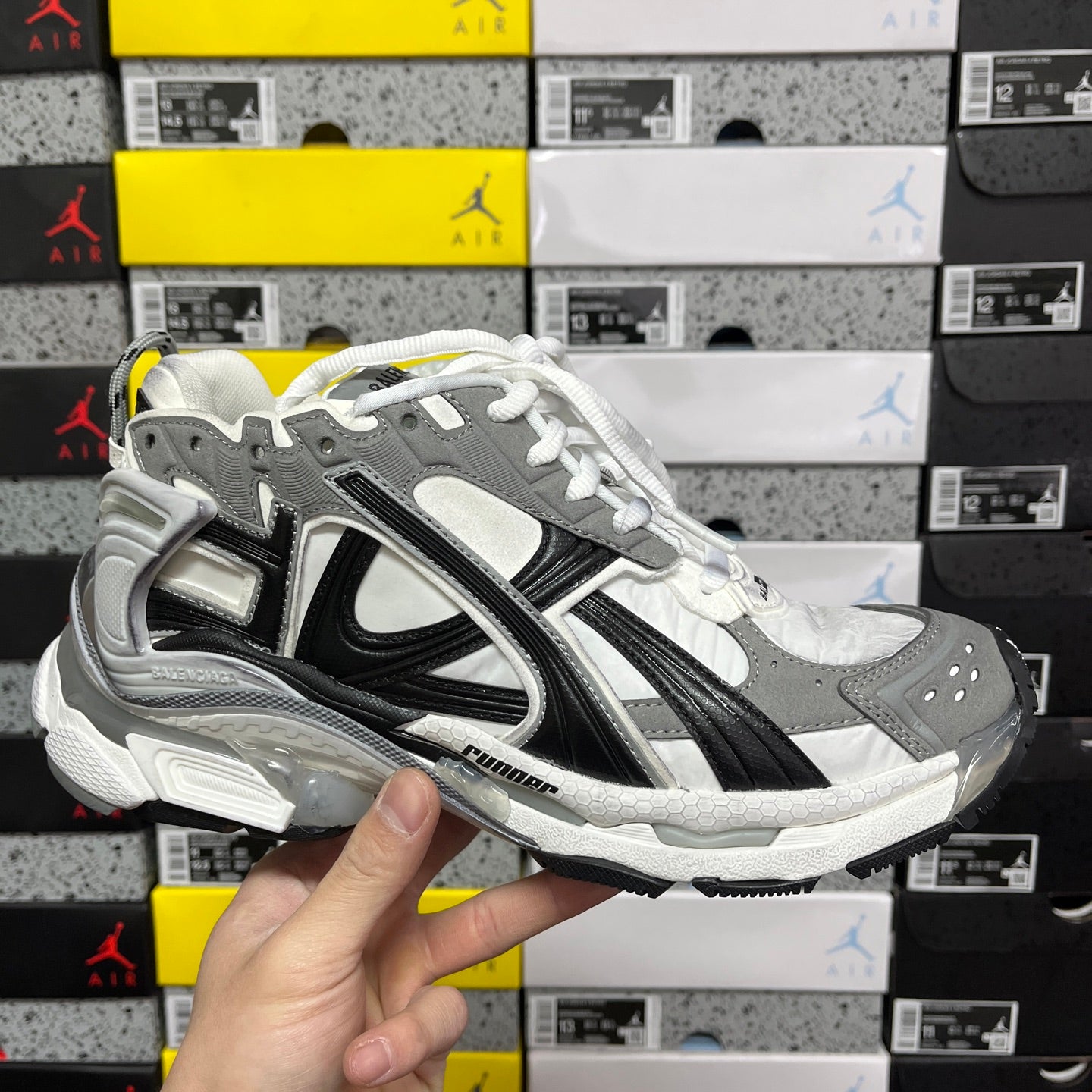 Balenciaga unisex running sneaker, gray and black with white laces