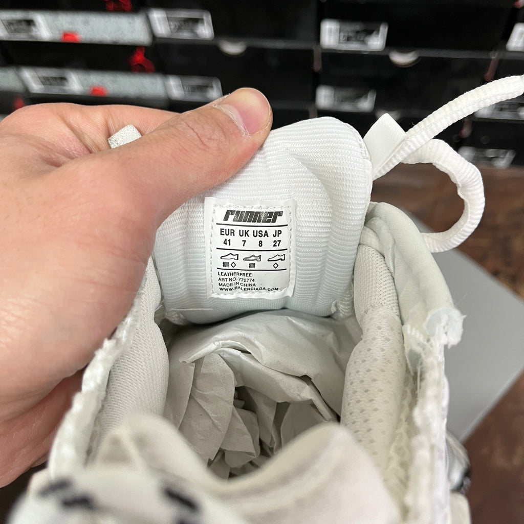 Balenciaga unisex sneaker interior label view, size text on white fabric lining