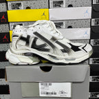 Balenciaga unisex lace-up sneaker, white upper with black panels and silver accents