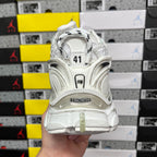Balenciaga unisex sneaker heel, white back panel with BALENCIAGA branding and laces