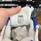 Balenciaga unisex running shoe insole label, white interior with size and care tag