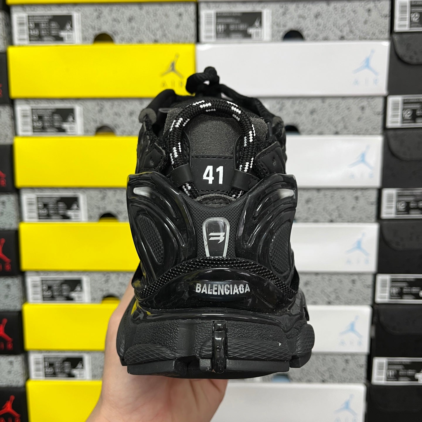 Balenciaga unisex black sneaker back view, size 41 marking and heel pull tab