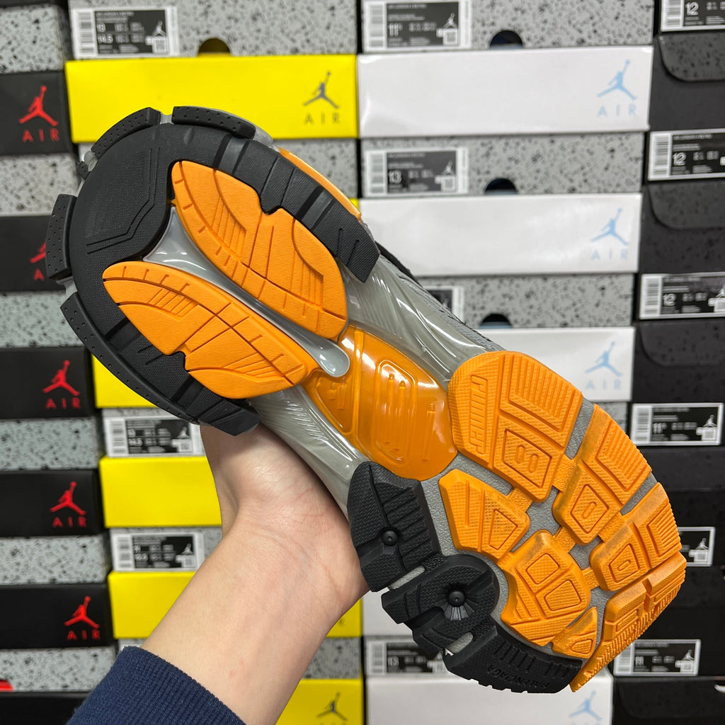 Balenciaga sneaker outsole, treaded gray rubber with orange traction sections