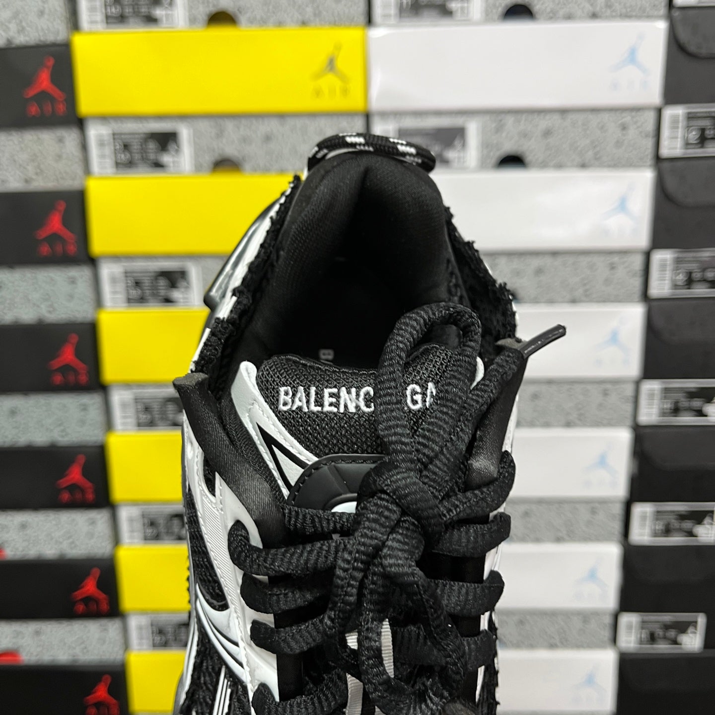 Runner sneaker heel, black upper with BALENCIAGA lettering and black laces