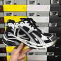Balenciaga unisex Runner sneaker, black and white mesh with lace-up