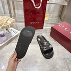 Gucci slide sandal outsole with embossed GG logo tread sole