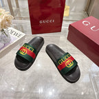 Gucci slide sandals in black leather look with green-red-green GG logo strap
