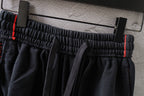 Black Balenciaga shorts waistband with elastic fit and adjustable drawstring detail.