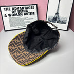 FF-logo cap interior showing black lining and crown seam, brown top with yellow trim