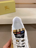Burberry sneakers tongue and collar, white lining with plaid strap and logo