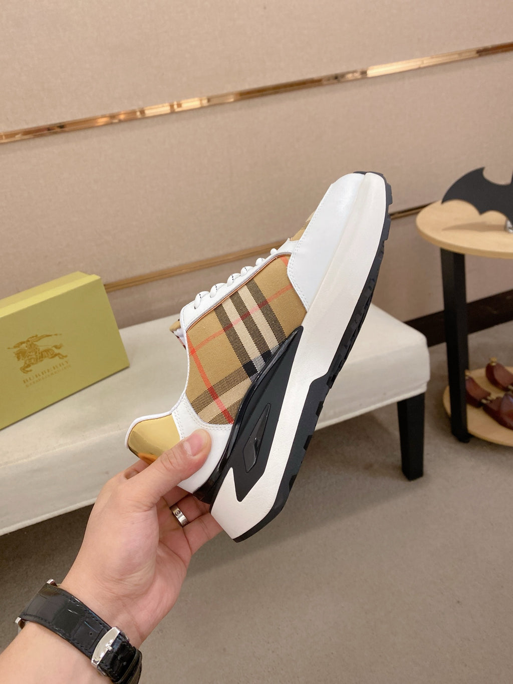 Burberry sneakers back view, white leather with plaid stripe, gold lining, chunky sole