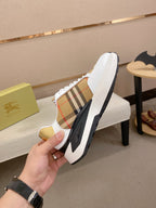 Burberry sneakers back view, white leather with plaid stripe, gold lining, chunky sole