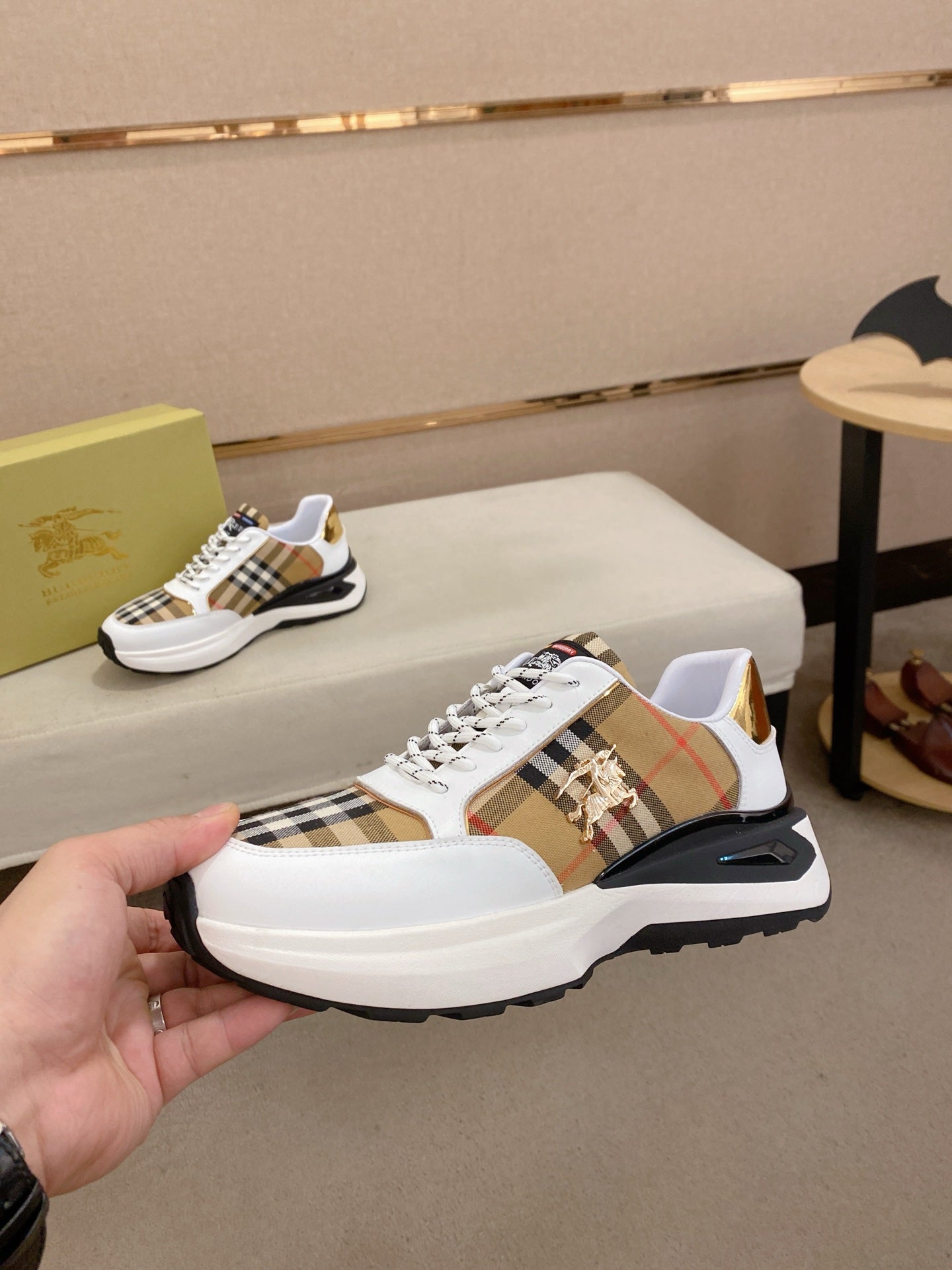 Burberry sneakers, white and tan plaid panels with gold accents, chunky sole