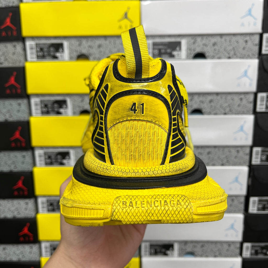 Yellow sneaker heel with BALENCIAGA text and size '41' on back