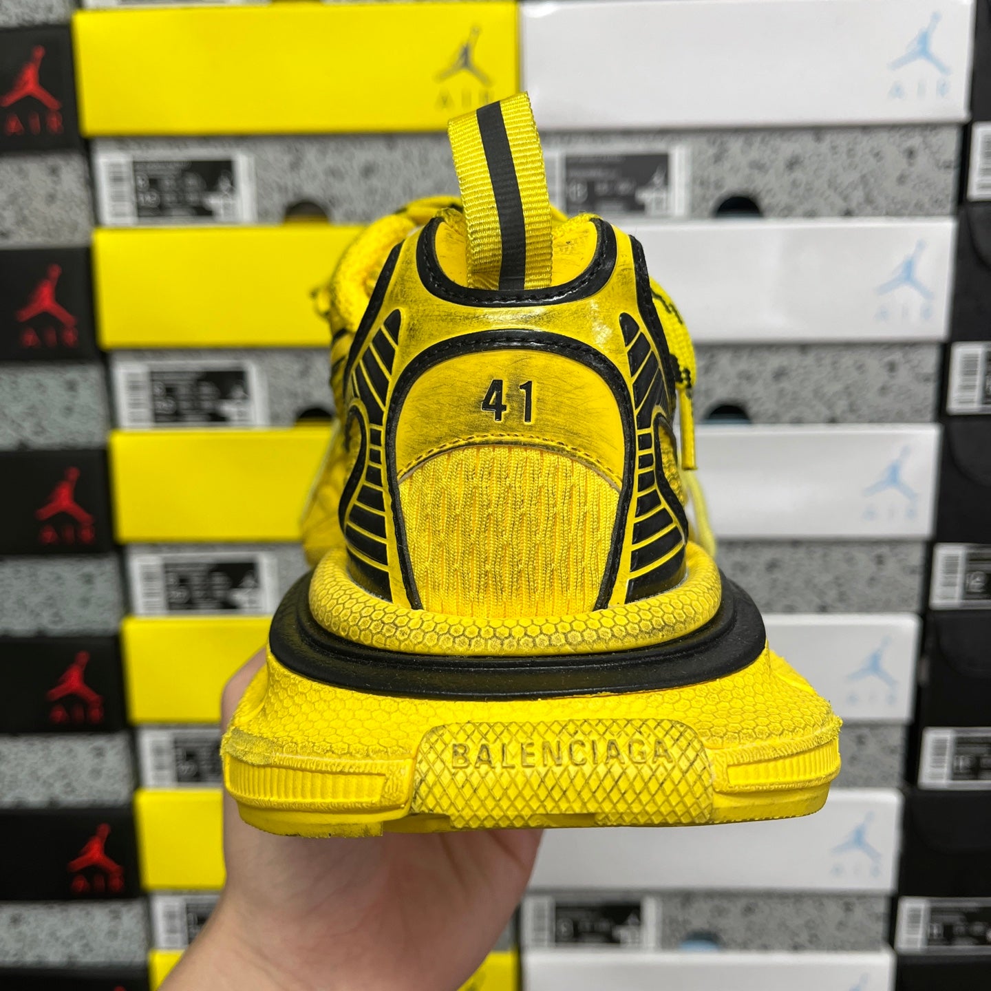 Yellow sneaker heel with BALENCIAGA text and size '41' on back