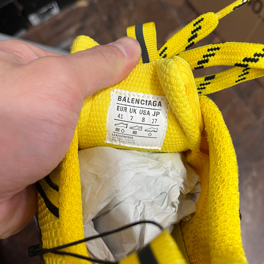Yellow sneaker inner label with BALENCIAGA and size '41' text