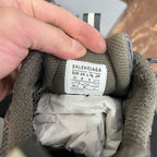 Balenciaga unisex sneaker size label inside, "EUR UK" text on gray fabric lining