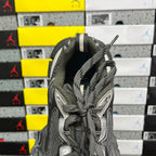 Balenciaga unisex sneaker interior view at heel, dark gray padded lining and lace-up laces