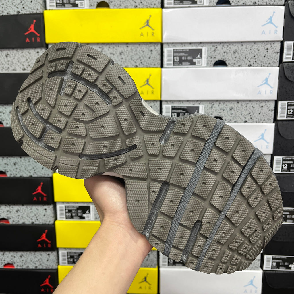 Balenciaga unisex sneaker outsole, dark gray rubber tread pattern with raised traction blocks