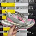 Balenciaga unisex running shoes in gray with pink accents and lace-up front