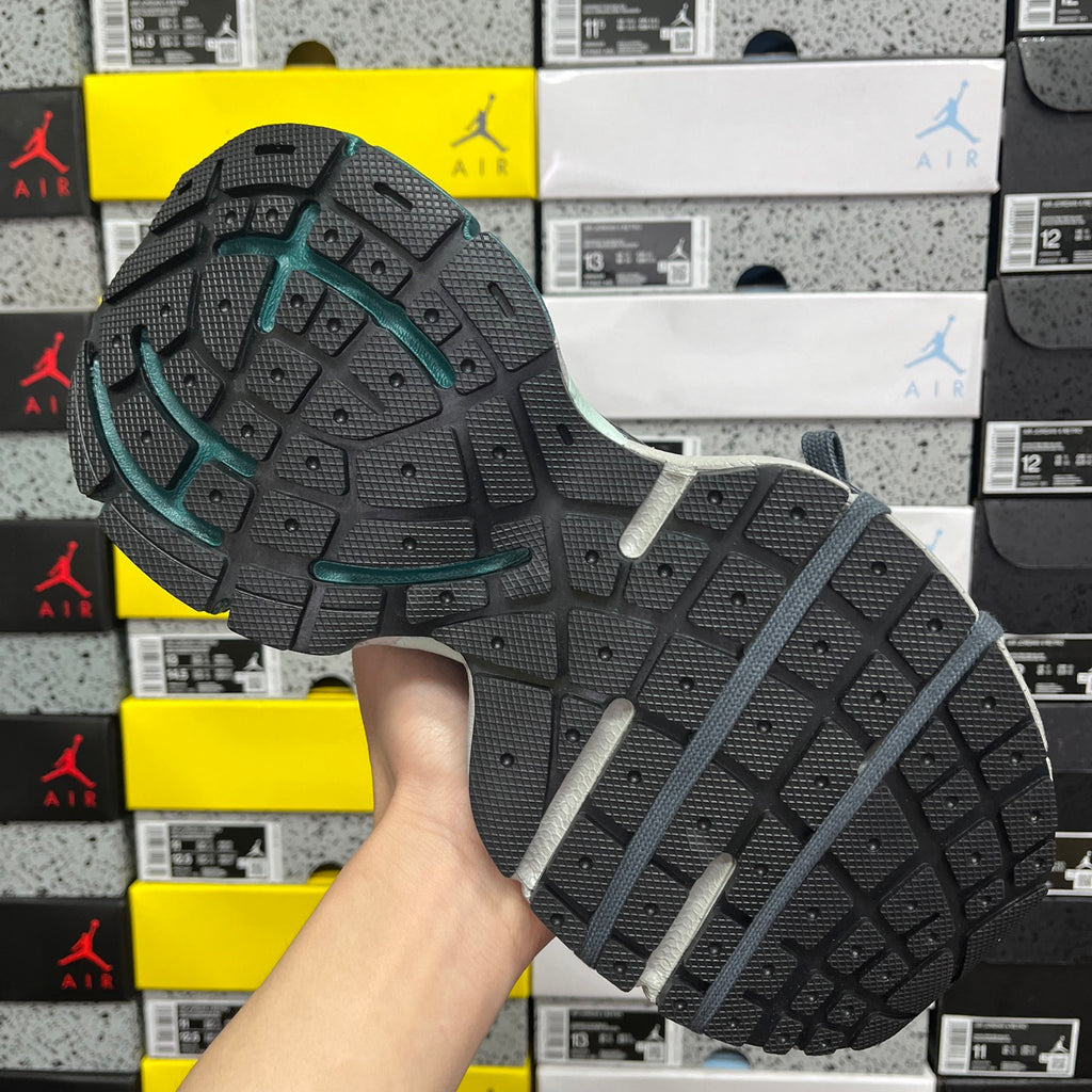 Unisex Balenciaga sneaker outsole with dark tread and gray sidewall
