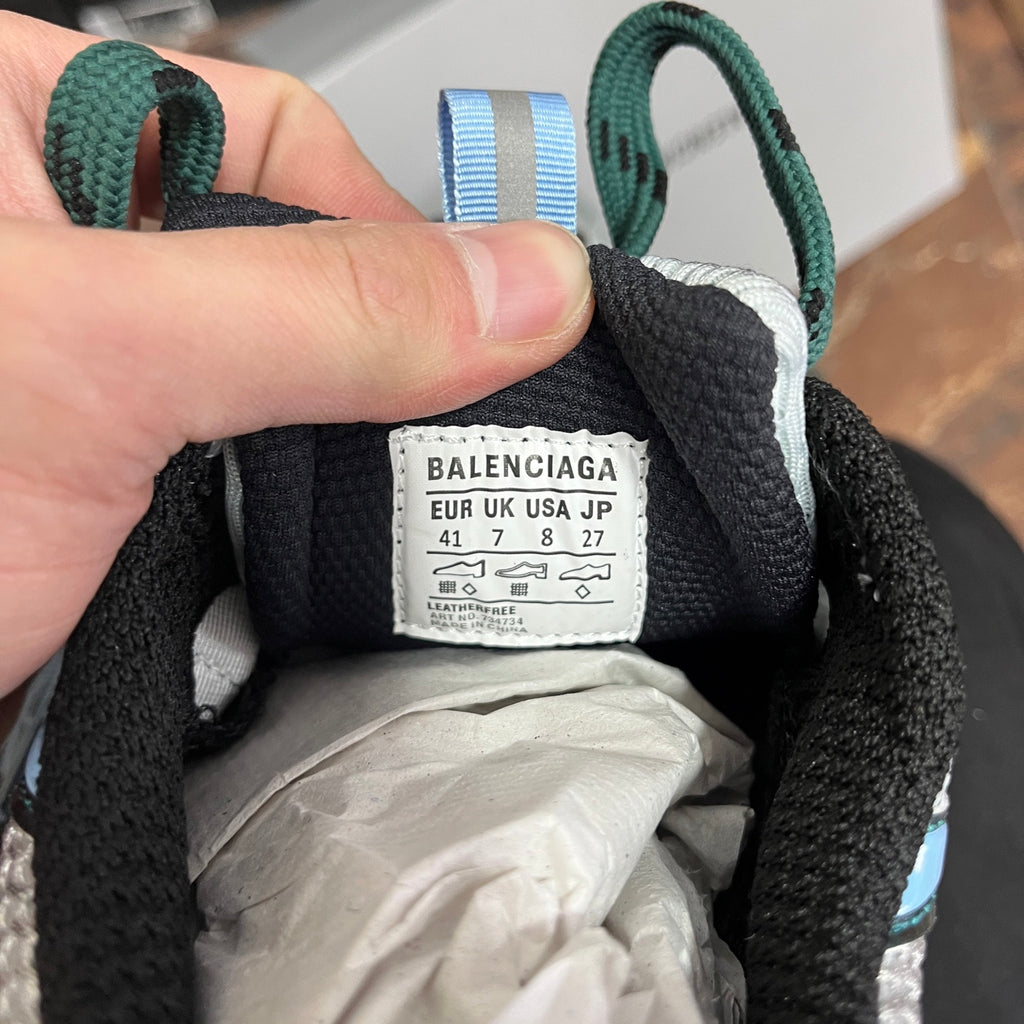 Unisex Balenciaga sneaker size label on black lining with white interior