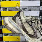 Balenciaga unisex sneaker quarter view, light gray mesh with cushioned padded collar