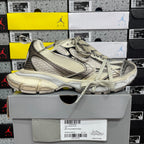 Balenciaga unisex sneaker side view, light gray mesh, chunky sole, lace-up